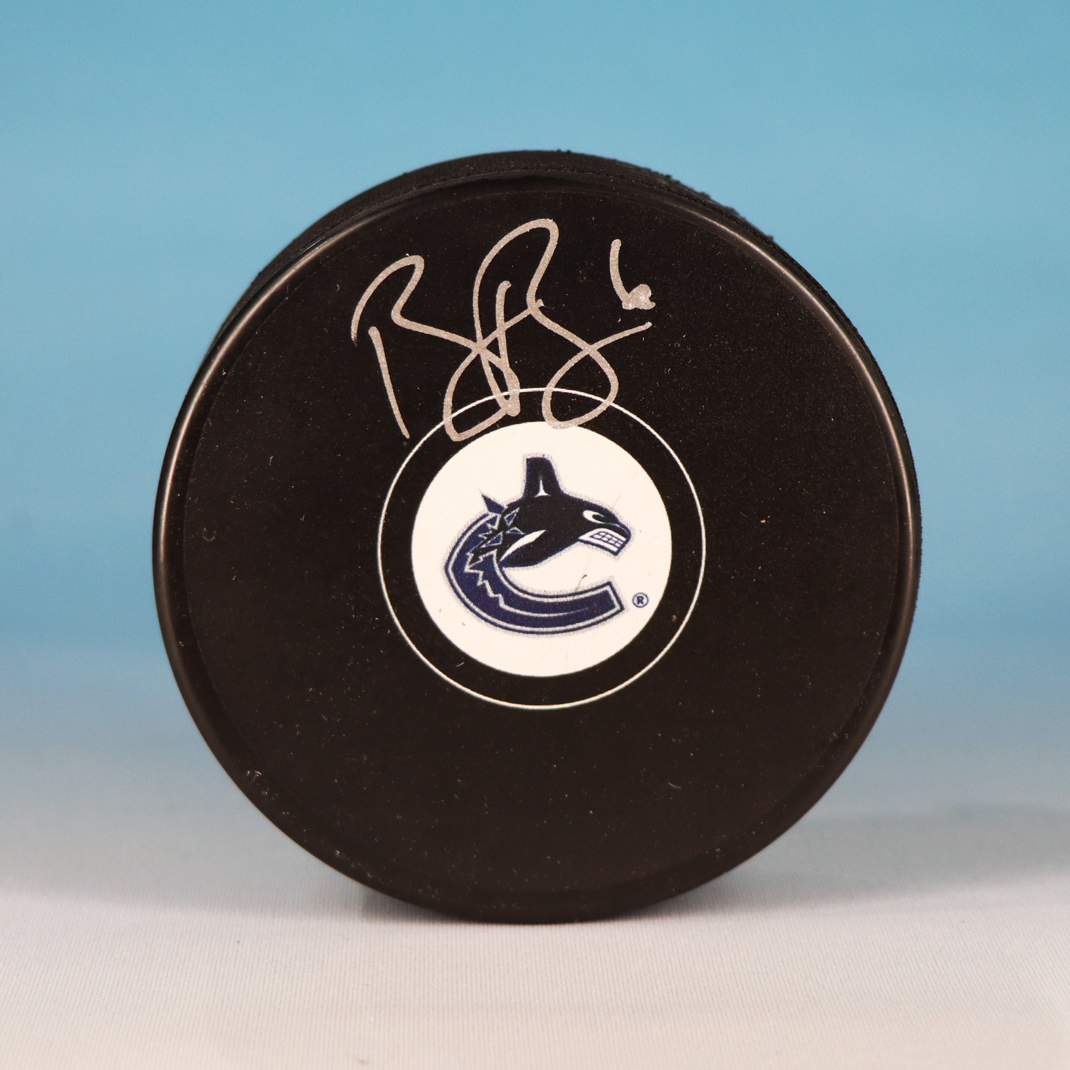 Brock Boeser Vancouver Canucks Autographed Hockey Puck (Fanatics Authentic)