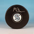 Matty Beniers Seattle Kraken Autographed Hockey Puck (Fanatics Authentic)