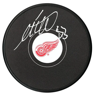 Moritz Seider Autographed Detroit Red Wings Puck (COJO Sports)