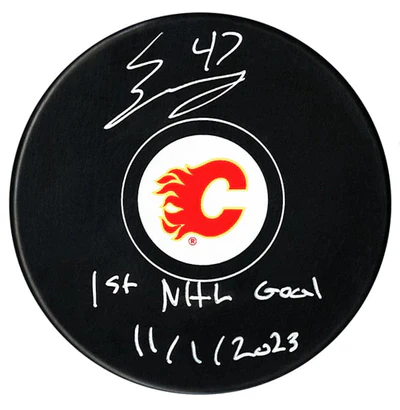 Connor Zary Autographed Calgary Flames 1st Goal Inscribed Puck (COJO Sports)