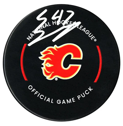 Connor Zary Autographed Calgary Flames Official Puck (COJO Sports)