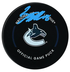 Conor Garland Autographed Vancouver Canucks Official Puck (COJO Sports)