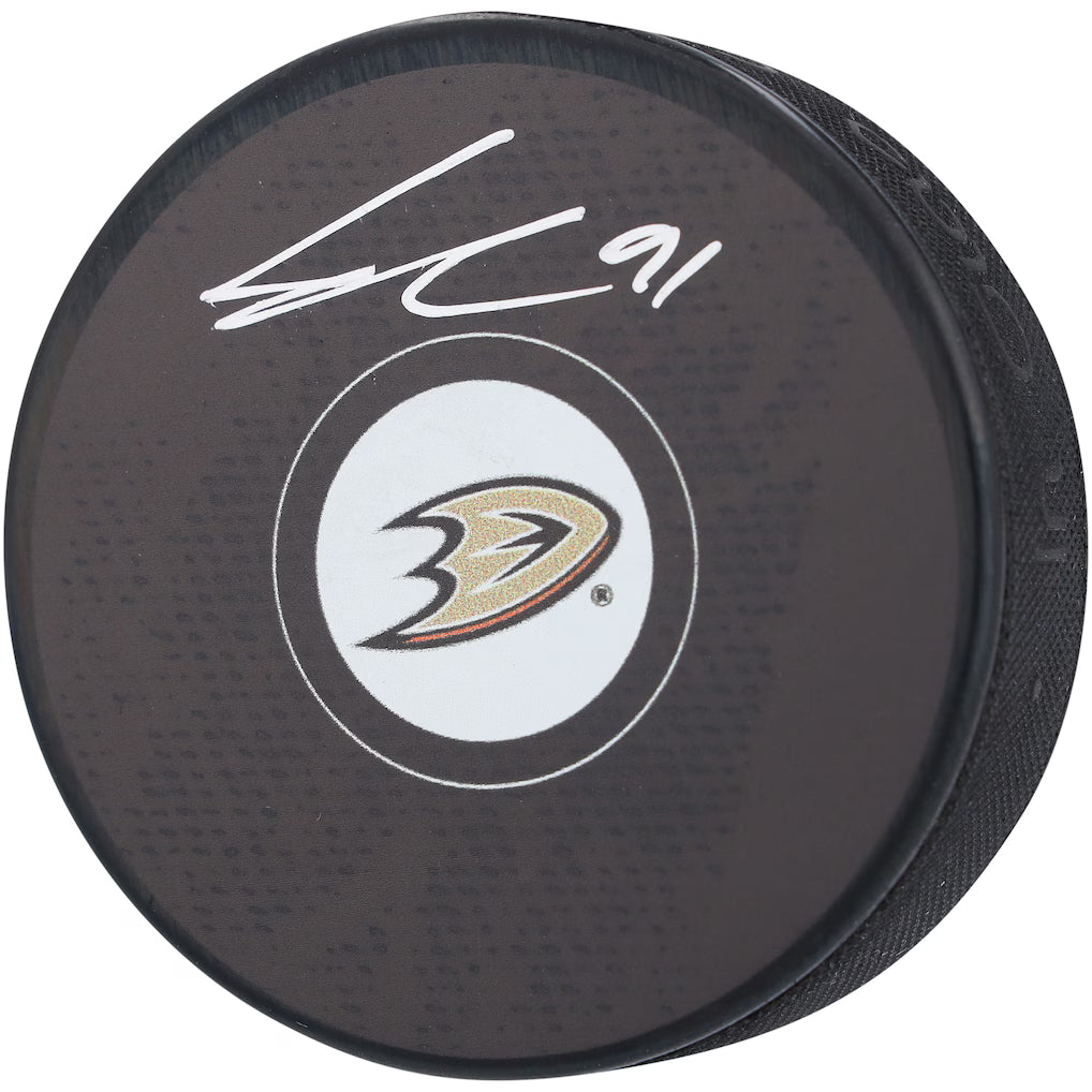 Leo Carlsson Anaheim Ducks Autographed Hockey Puck (Fanatics Authentic)