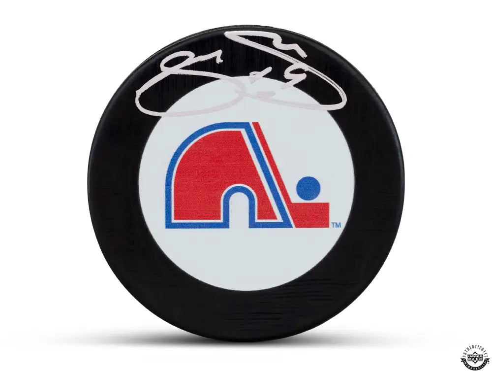 Joe Sakic Autographed Quebec Nordiques Rubber Hockey Puck (Upper Deck Authenticated)